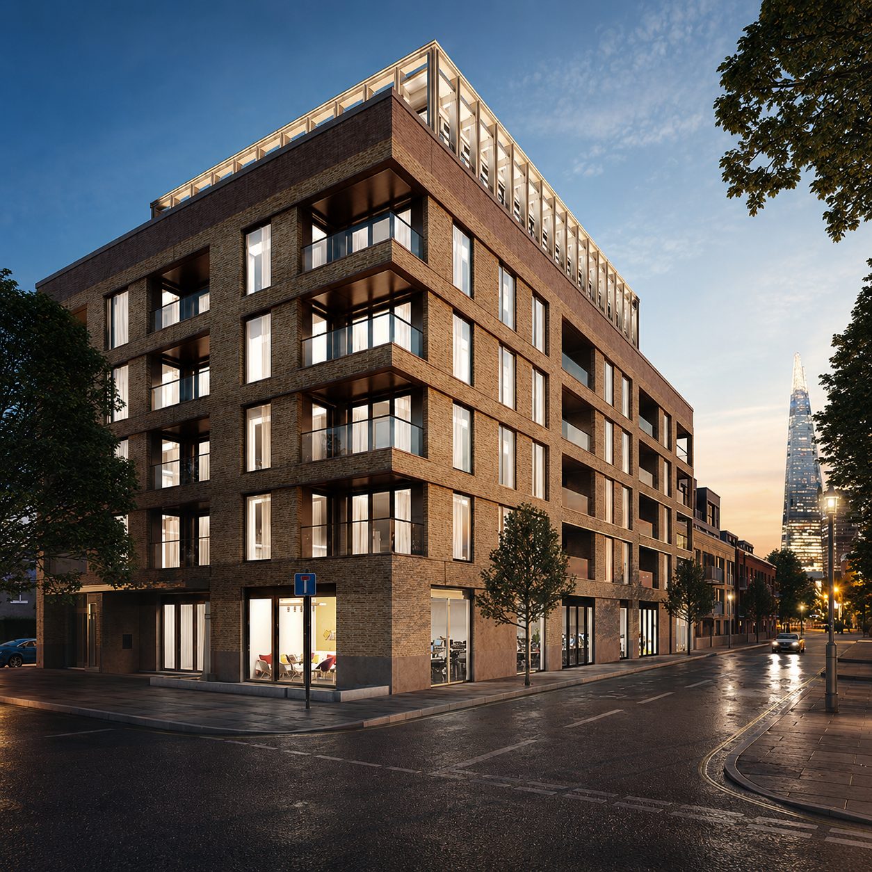 Design visualisation of Trilogy's brick corner at dusk, its ground-floor units lit from within and the Shard beyond